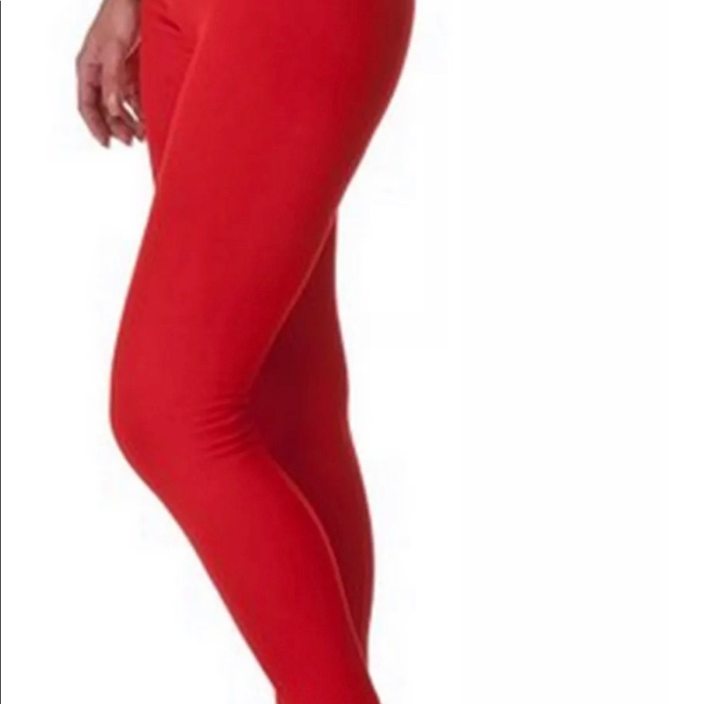 Women fleece lined leggings. Red color.
